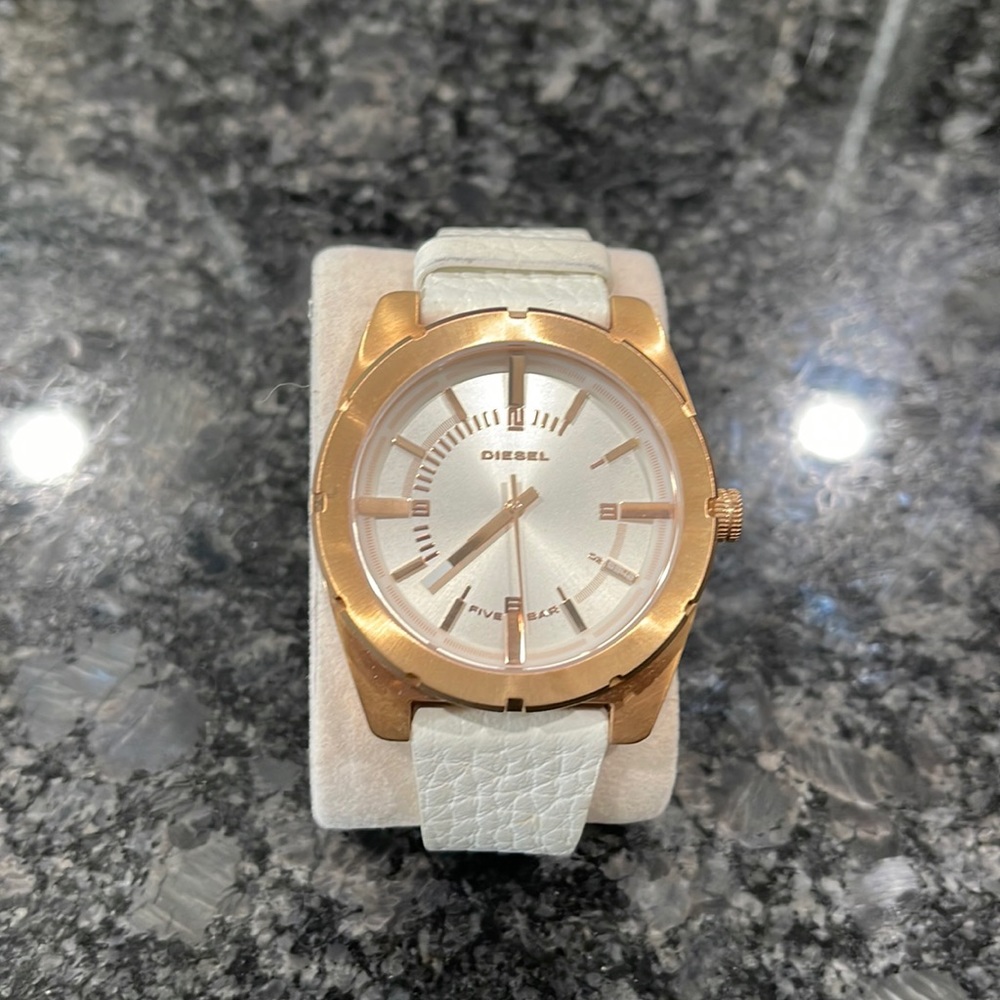Used Diesel watch. Shows signs on wear. Needs a new battery